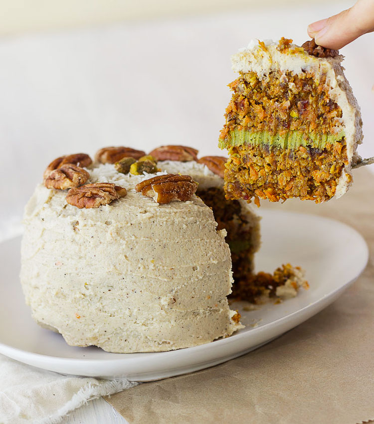 Incredibly Indulgent (and secretly healthy!) Raw Carrot Cake with Coconut-Matcha Frosting. Too good to be true! #vegan #raw 