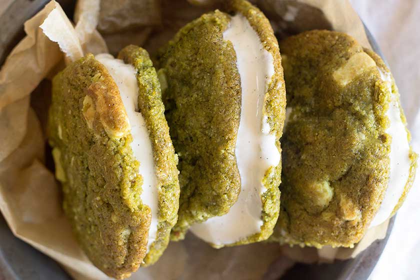 Matcha and White Chocolate Vegan Cookies | Chewy #vegan cookies made with matcha green tea powder and white chocolate, filled with delicious ice cream to make the most decade cookie sandwich!